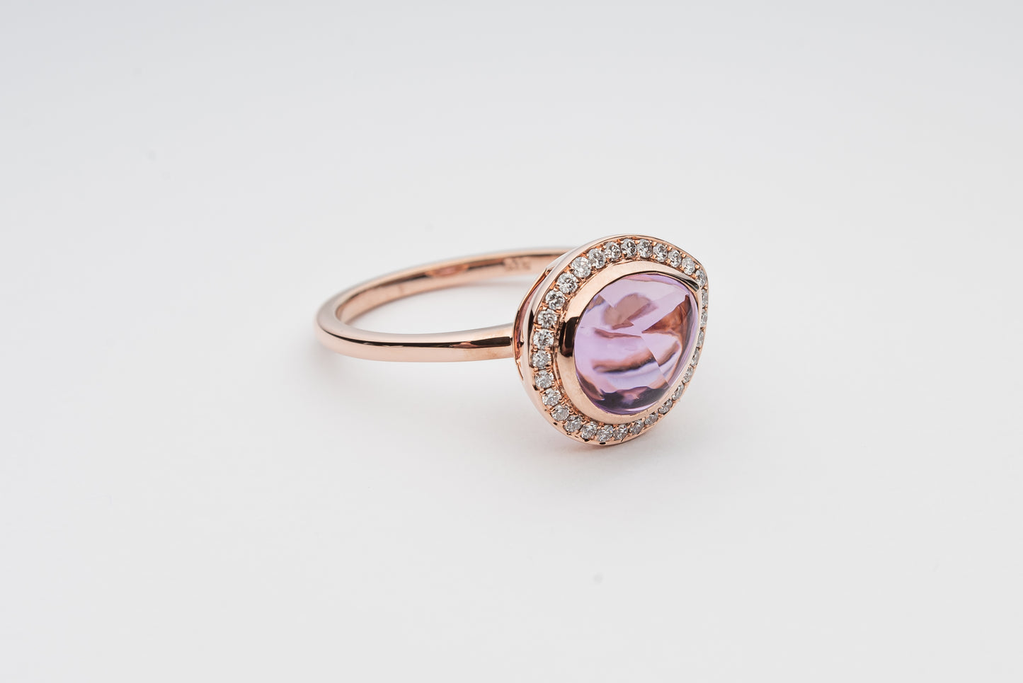 Cabochon cut Amethyst and Diamond ring